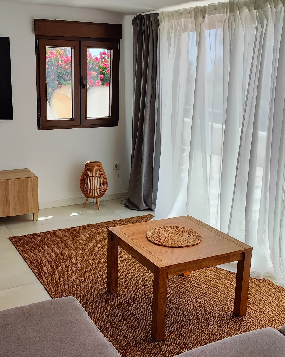 Obývací pokoj s TV v apartmánu Tenerife Golf & Ocean Apartment